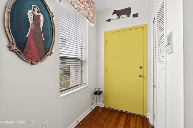 doorway to outside with hardwood / wood-style flooring