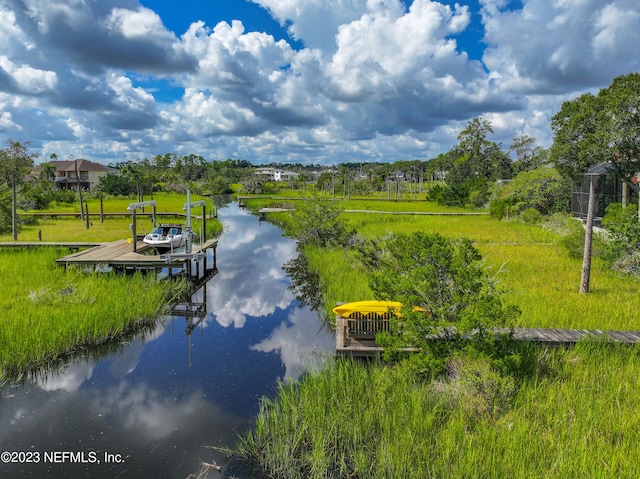 water view featuring a dock