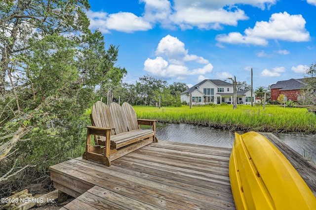 view of dock with a water view