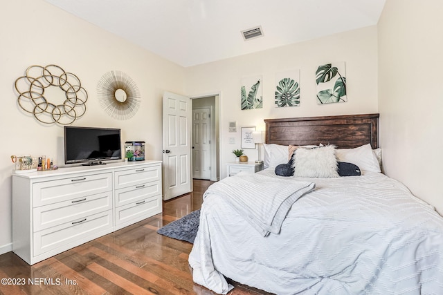 bedroom with wood-type flooring