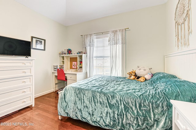 bedroom featuring hardwood / wood-style flooring