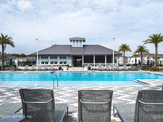 community pool with a patio