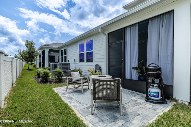 view of patio featuring fence