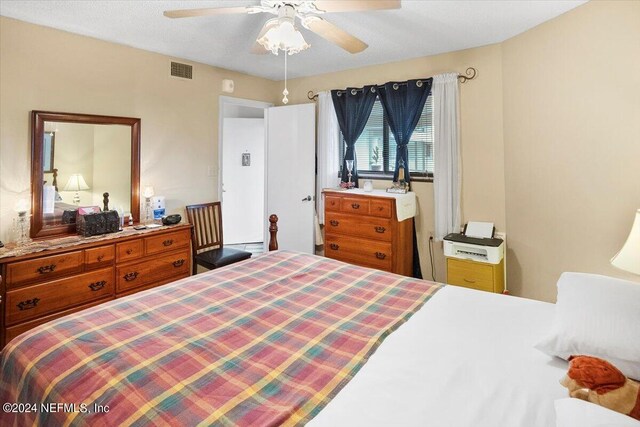 bedroom featuring ceiling fan