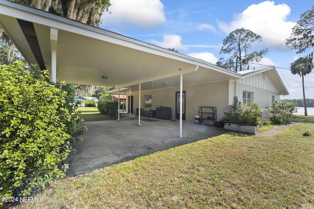 exterior space with a water view