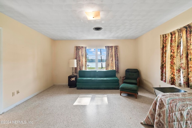 bedroom featuring a textured ceiling