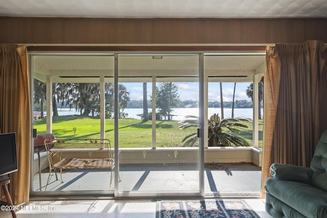 entryway featuring a water view