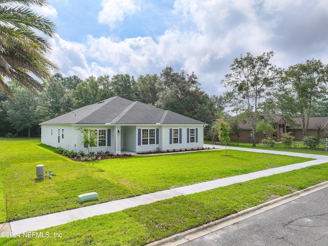 ranch-style house with a front yard