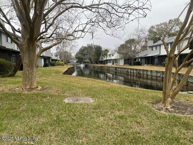 view of yard featuring a water view