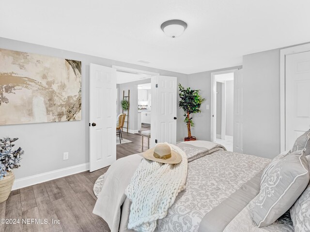 bedroom featuring hardwood / wood-style floors