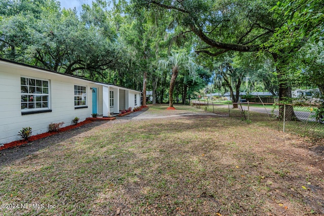 view of yard featuring fence