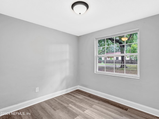 empty room featuring hardwood / wood-style floors