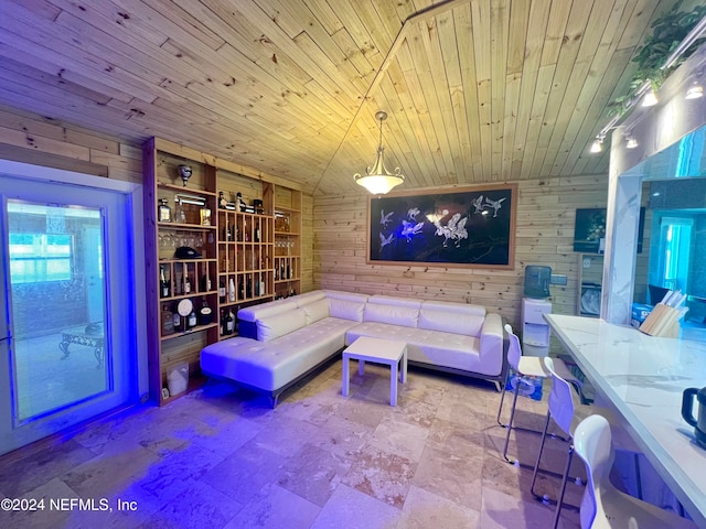 tiled living room with wood walls and wood ceiling