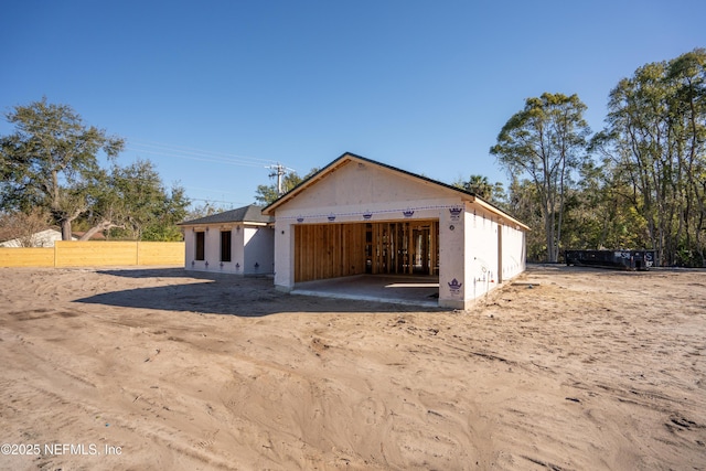 exterior space featuring fence