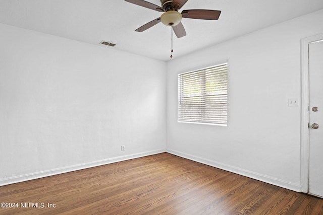 unfurnished room with ceiling fan and wood-type flooring