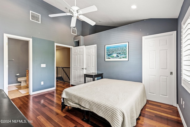 bedroom with ceiling fan, dark hardwood / wood-style flooring, and vaulted ceiling