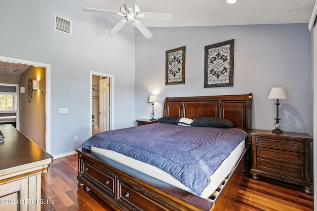 bedroom with high vaulted ceiling, ceiling fan, and dark hardwood / wood-style floors