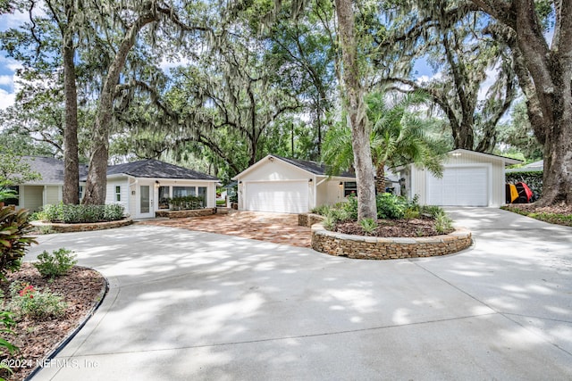 ranch-style home with a garage