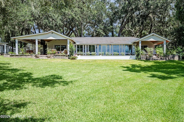 view of front of home with a front lawn