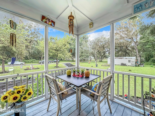 unfurnished sunroom featuring a wealth of natural light