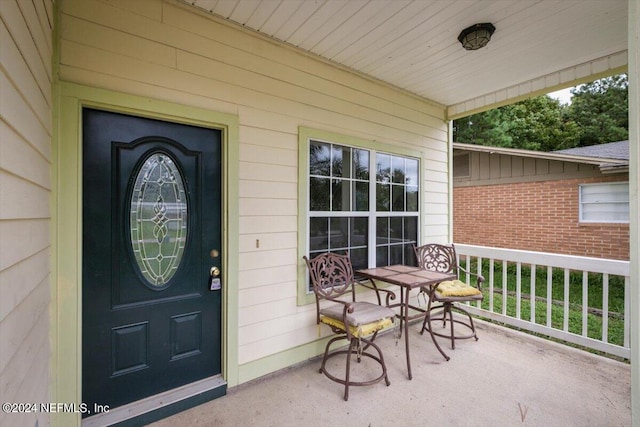 entrance to property with a porch