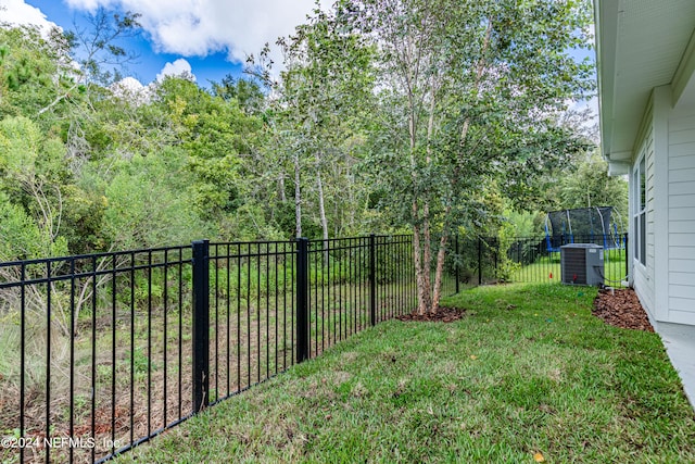 view of yard featuring central AC