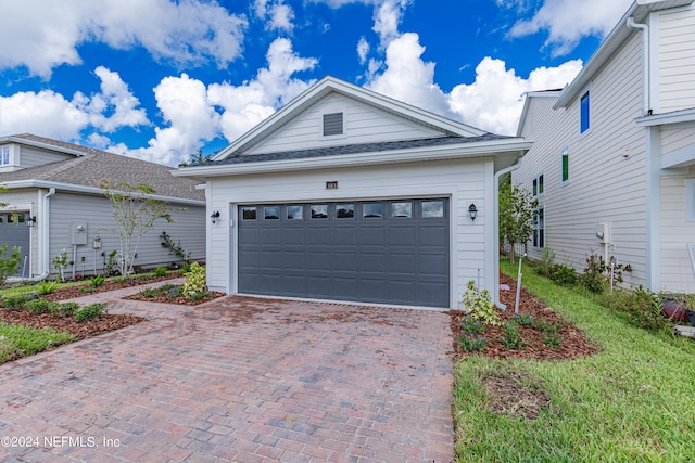 view of front of home featuring a garage