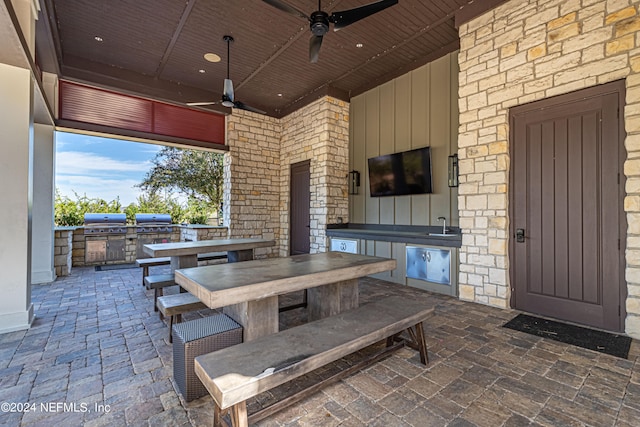 view of patio / terrace featuring grilling area, ceiling fan, and area for grilling