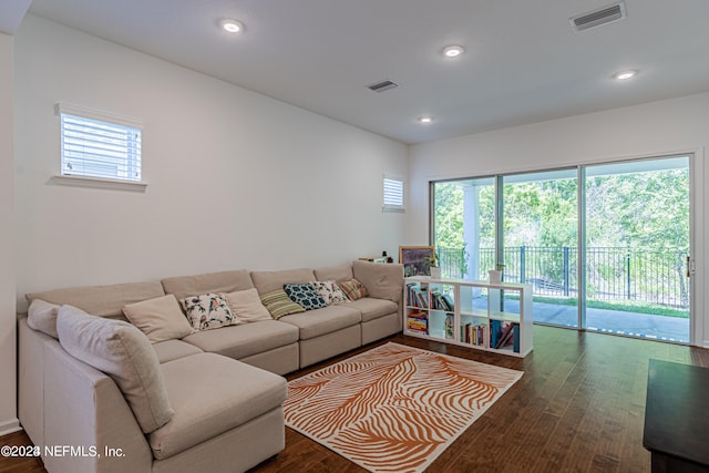 living room featuring dark hardwood / wood-style flooring