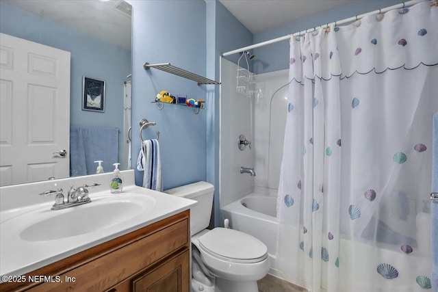 full bathroom featuring vanity, toilet, and shower / tub combo with curtain