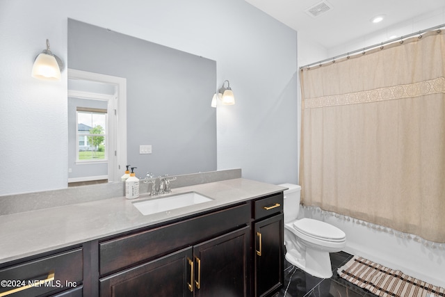 full bathroom featuring shower / bath combination with curtain, toilet, and vanity