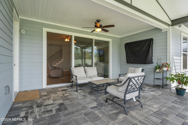 view of patio with ceiling fan and an outdoor hangout area