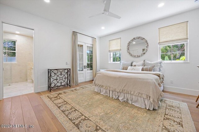 bedroom featuring ceiling fan and light hardwood / wood-style flooring