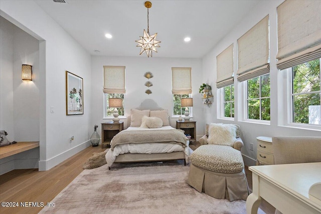 bedroom featuring light hardwood / wood-style flooring