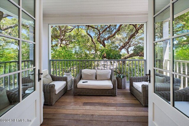 sunroom / solarium with a healthy amount of sunlight