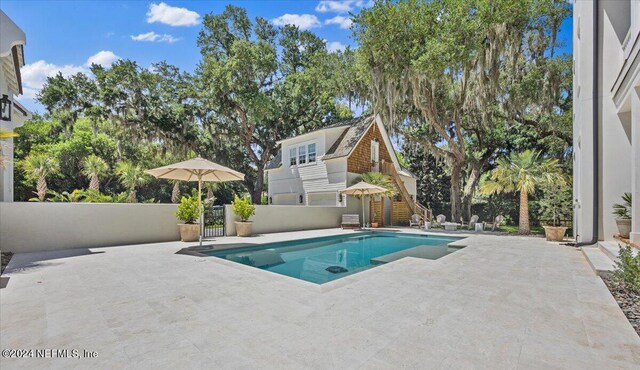 view of pool with a patio