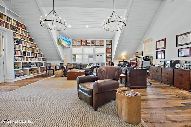 interior space featuring high vaulted ceiling, beam ceiling, an inviting chandelier, and hardwood / wood-style floors