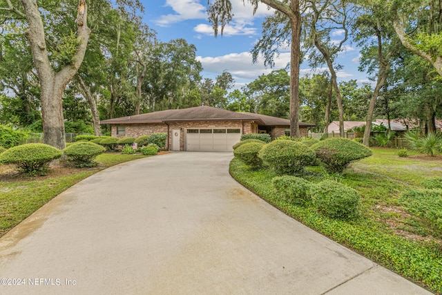 view of front of property with a garage