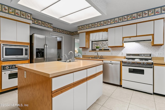 kitchen featuring white cabinetry and stainless steel appliances