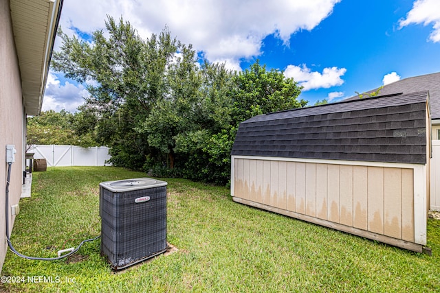 view of yard with central air condition unit