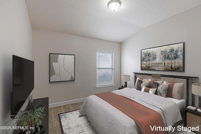 208 Clear Creek Ct, Saint Augustine, FL 32095 - carpeted bedroom with a textured ceiling, vaulted ceiling, and baseboards