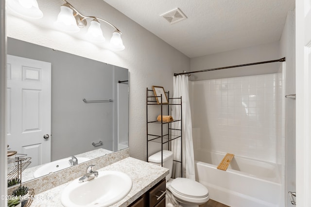 full bathroom with a textured ceiling, vanity, toilet, and shower / bathtub combination with curtain