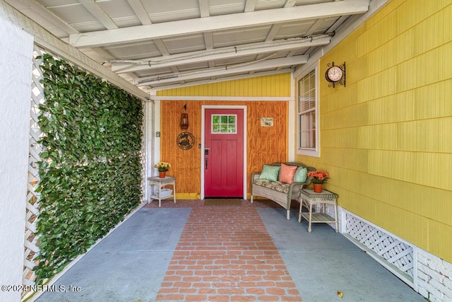 entrance to property with a porch