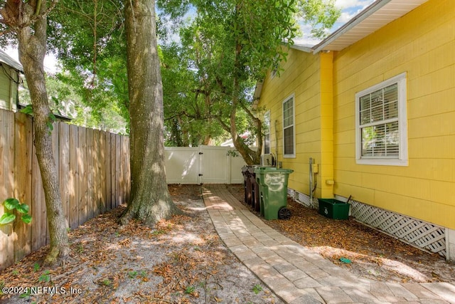 view of yard with a gate and fence