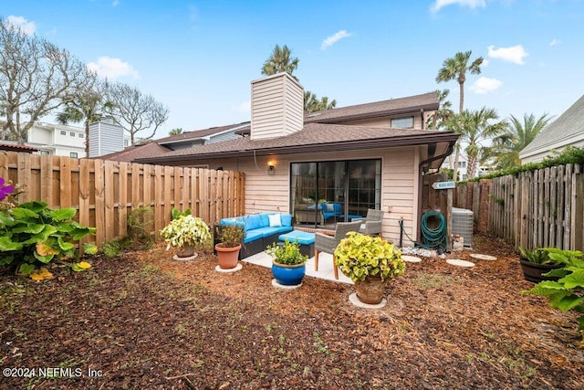 rear view of house featuring outdoor lounge area