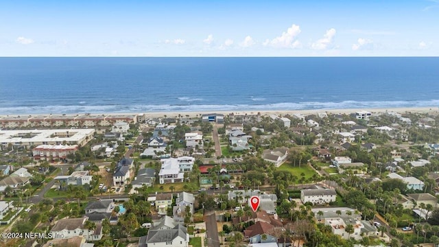 bird's eye view with a beach view and a water view