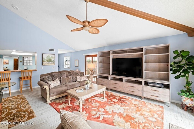 living room with high vaulted ceiling, ceiling fan, and light hardwood / wood-style floors