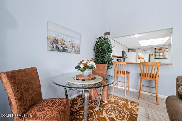 dining room featuring light wood-type flooring