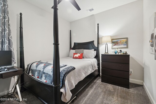 bedroom featuring ceiling fan and carpet