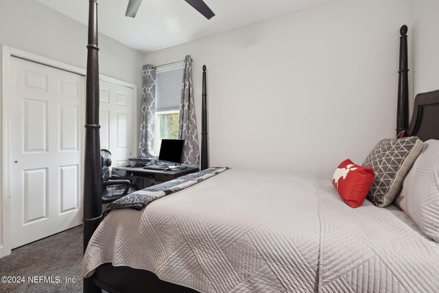 bedroom with ceiling fan and carpet floors